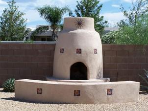 Stucco Fireplace, Block Retaining Wall, and Block Fence